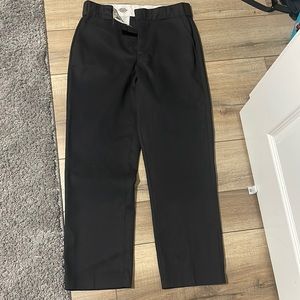 Straight leg Dickies pants.